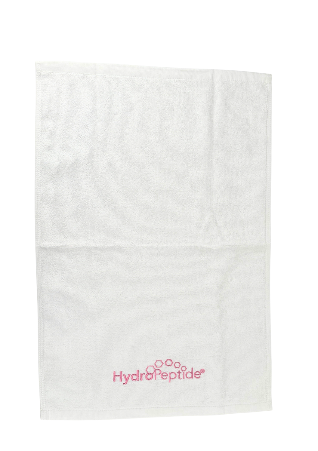 TOWEL HYDROPEPTIDE SMALL, WHITE WITH PINK LOGO 
40x60 cm Kleines Baumwollhandtuch mit HydroPeptide-Logo, weiß mit rosa Stickerei