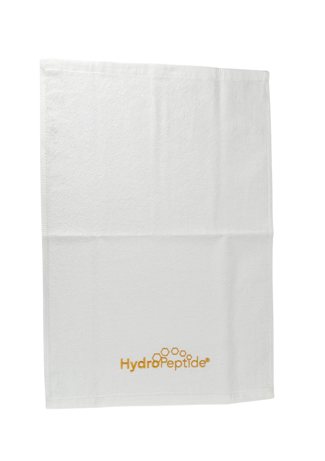 TOWEL HYDROPEPTIDE SMALL, WHITE WITH GOLDEN LOGO 
40x60 cm Kleines Baumwollhandtuch mit HydroPeptide-Logo, weiß mit goldener Stickerei